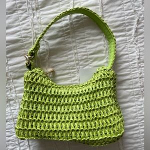 Bright green raffia handbag